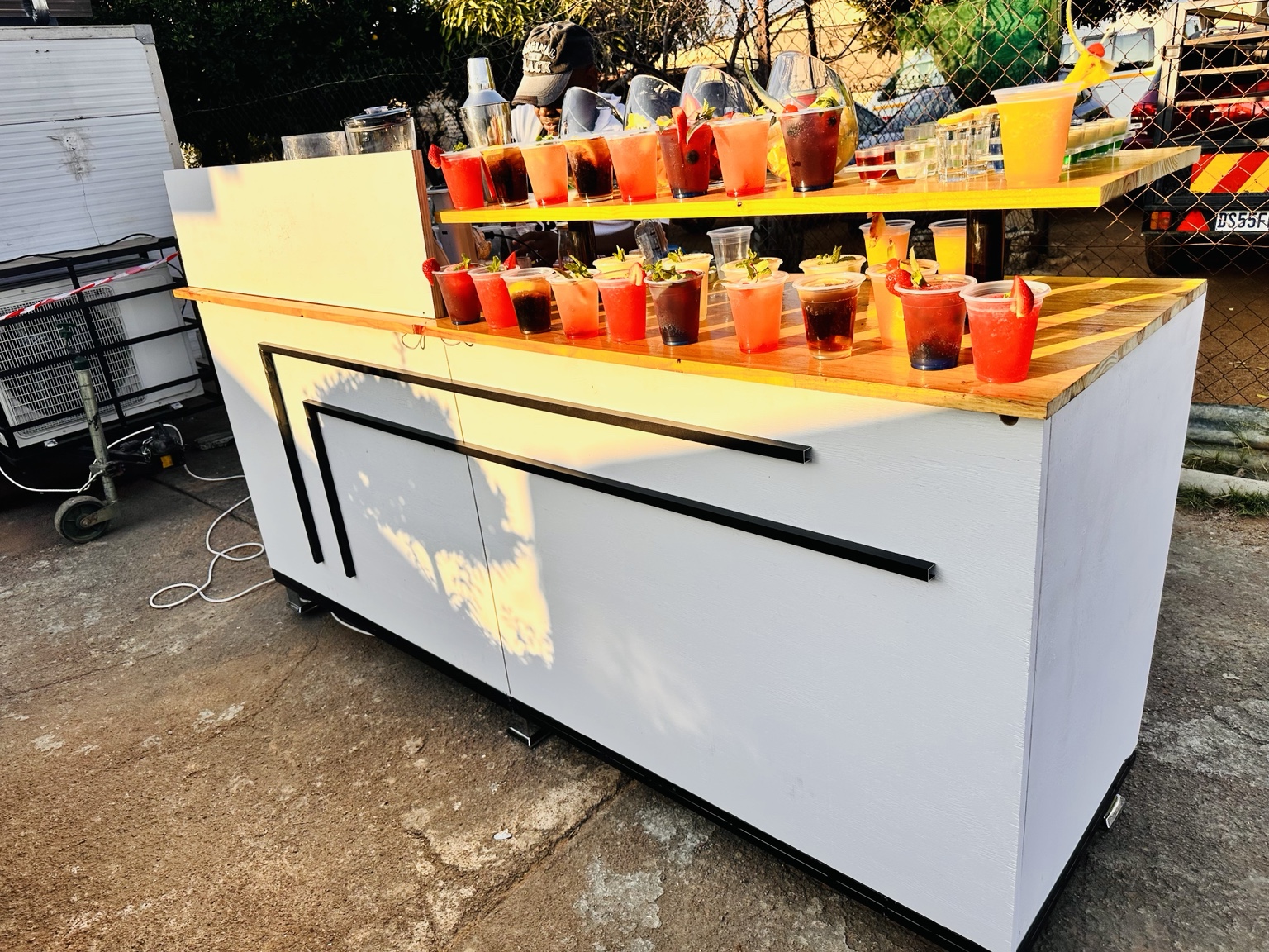Primetime Cocktails mobile bar with drinks prepared for an outdoor event