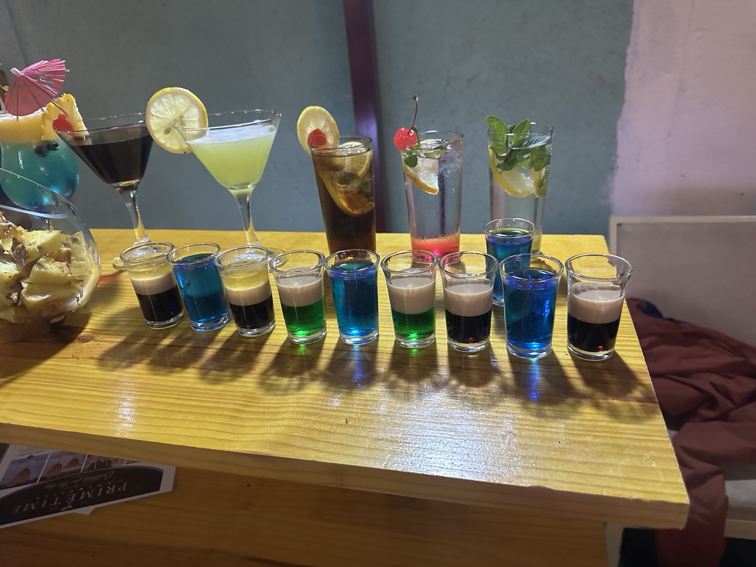 Cocktails and colourful shooters displayed together